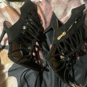 Lace up black suede heals